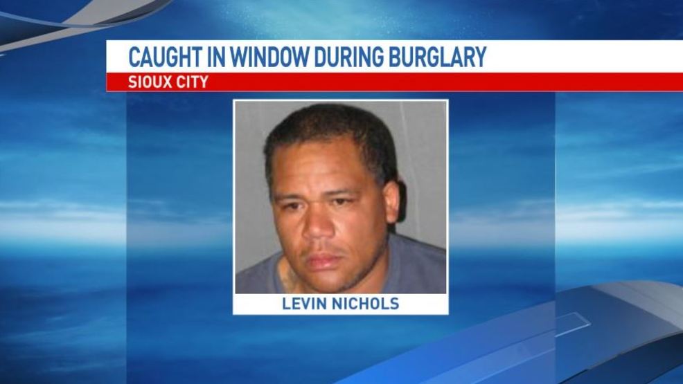 Police arrest man stuck in Iowa home's window well KGAN