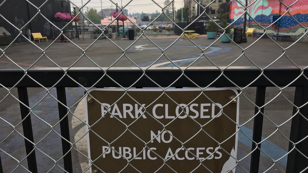 Olympia artesian commons park closure sign KOMO CBz.jpg Olympia artesian commons park closure sign KOMO CBz.jpg