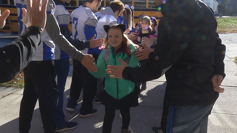 High Five Fridays bring smiles to elementary schools 