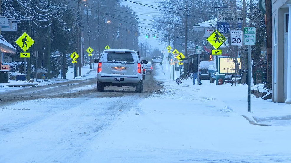 Weaverville residents wake to find several inches of snow & icy roads