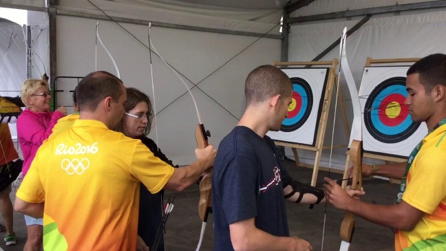 Postcard from Rio: Danny Beisel gives archery a shot