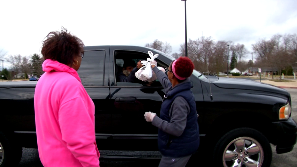 Toledo Public Schools staff distributing consistent meal provision